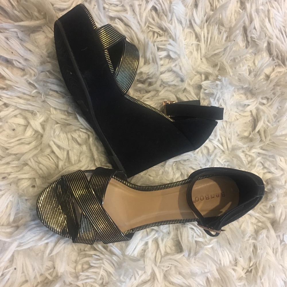 Gold and black heels
